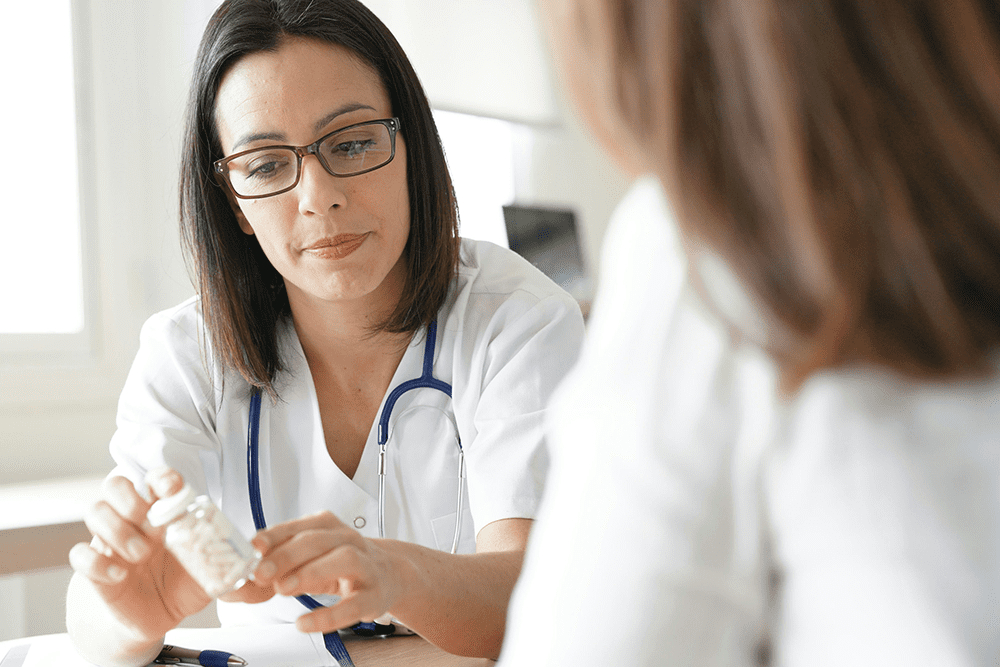 a doctor explaining medication instructions
