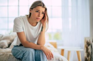 girl coping with the emotional impact of alcohol abuse