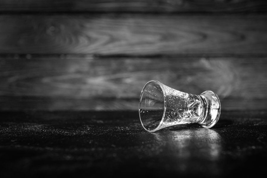 Shot glass representing how long alcohol stays in your system